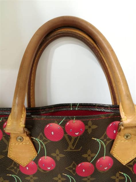 louis vuitton cherry purse history